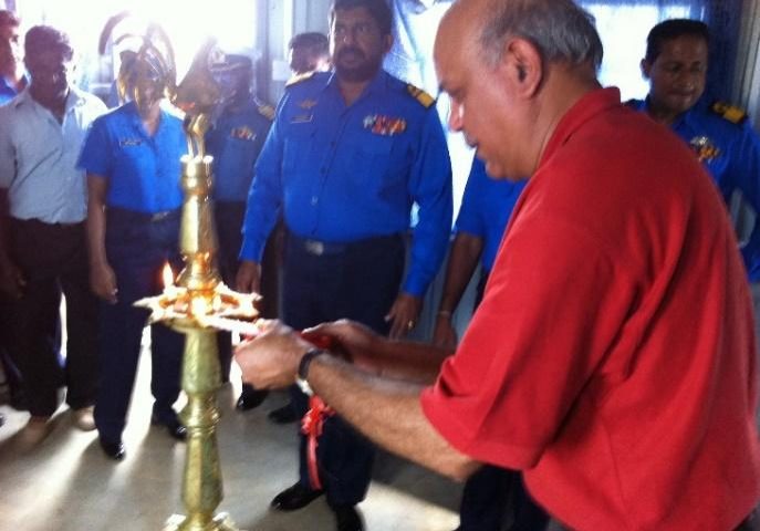 Captain Farhat Lighting A Dedication Candle At The Navy Barracks Building Dedication. The Ceremony Was Officiated By Priests From Hindu, Tamil, Buddhist And Catholic Religions.2