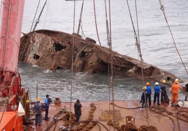 Recovering A Navy Vessel Sunk By A High Speed Suicide Boat, Loaded With Explosives, That Detonated On Impact.