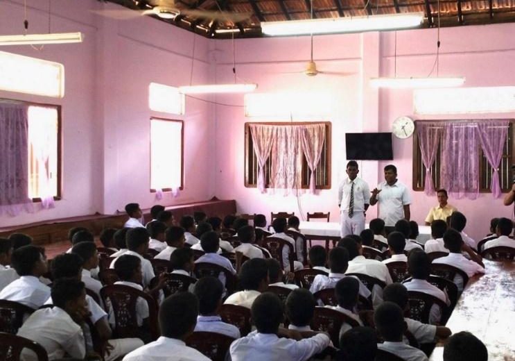 Sumith And Waratunga Talking With A Class Of Students